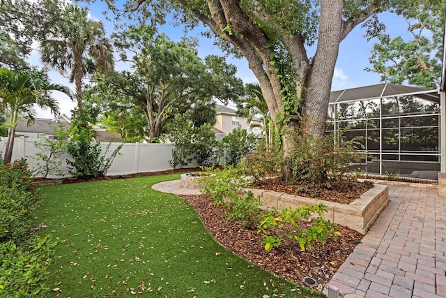 3307 W Knights Ave, Tampa, FL 33611 - view of yard featuring a lanai and a patio area