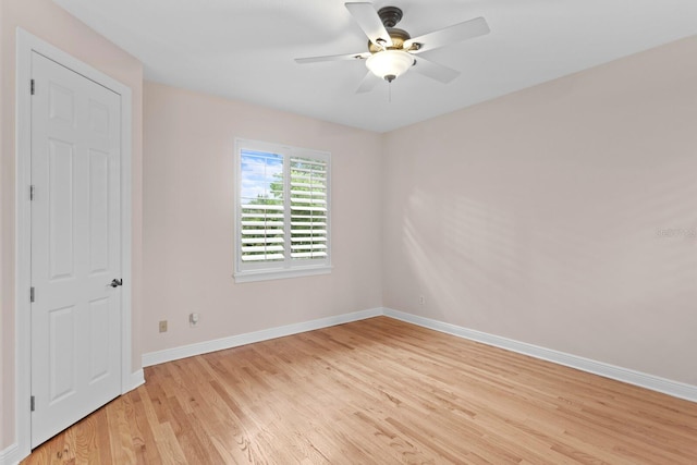 3307 W Knights Ave, Tampa, FL 33611 - unfurnished room featuring light wood-style floors and ceiling fan