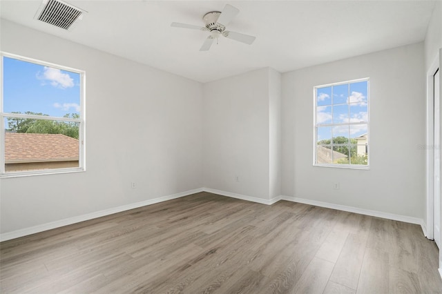 3013 Silvermill Loop Unit O, Land O Lakes, FL 34638 - unfurnished room with wood finished floors and a ceiling fan