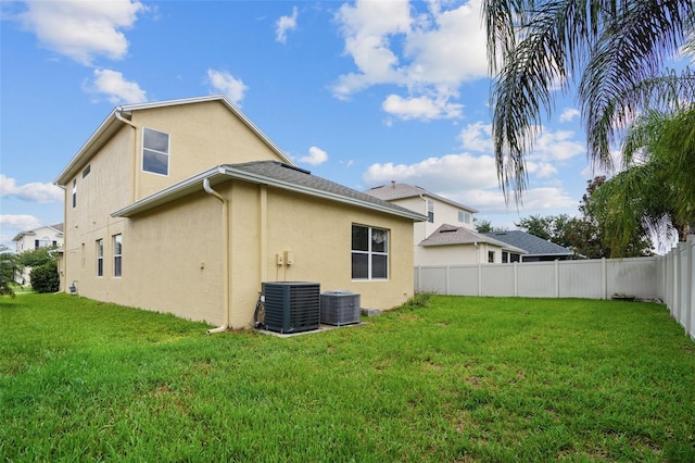 3013 Silvermill Loop Unit O, Land O Lakes, FL 34638 - rear view of property featuring stucco siding