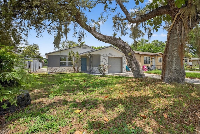 4535 15th Ave S, Saint Petersburg, FL 33711 - ranch-style home with an attached garage and concrete driveway