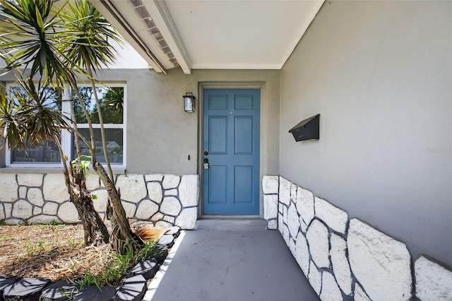 4535 15th Ave S, Saint Petersburg, FL 33711 - property entrance with stucco siding and stone siding