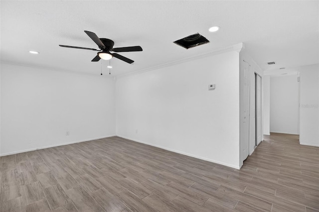 4535 15th Ave S, Saint Petersburg, FL 33711 - empty room with wood finished floors, ceiling fan, crown molding, and recessed lighting