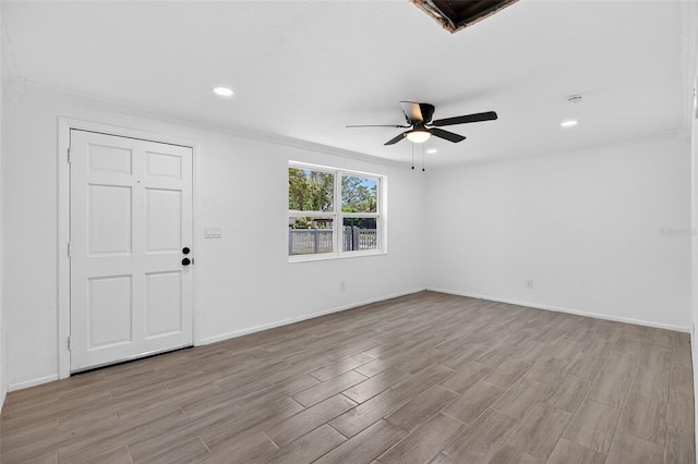 4535 15th Ave S, Saint Petersburg, FL 33711 - empty room with ceiling fan, light wood-style flooring, crown molding, and recessed lighting