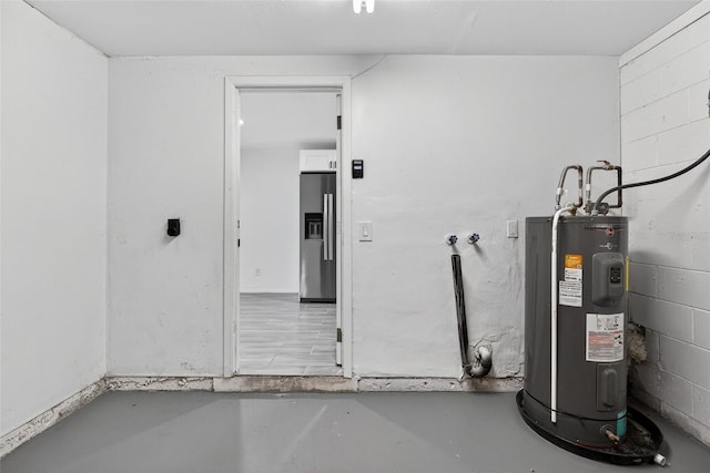 4535 15th Ave S, Saint Petersburg, FL 33711 - garage with water heater and stainless steel refrigerator with ice dispenser