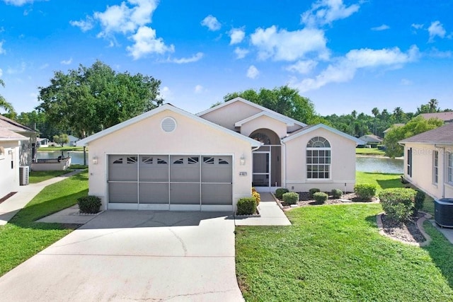 4407 Whitton Way, New Port Richey, FL 34653 - single story home with driveway, a garage, stucco siding, and a front yard