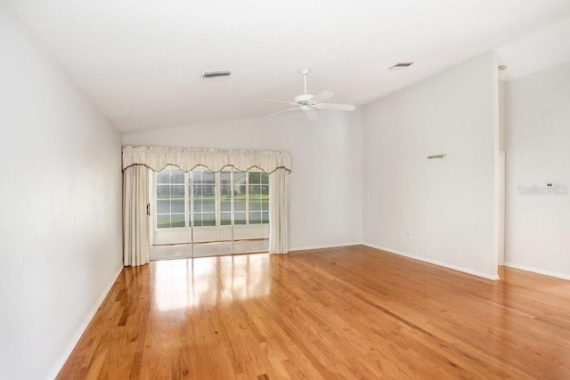 4407 Whitton Way, New Port Richey, FL 34653 - empty room with a ceiling fan, wood finished floors, and lofted ceiling