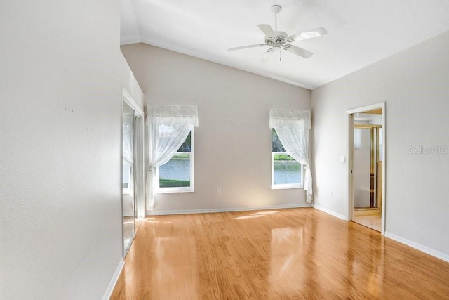 4407 Whitton Way, New Port Richey, FL 34653 - empty room featuring lofted ceiling, wood finished floors, and ceiling fan