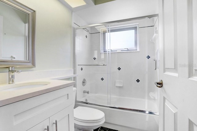 4407 Whitton Way, New Port Richey, FL 34653 - bathroom featuring vanity and combined bath / shower with glass door