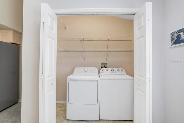4407 Whitton Way, New Port Richey, FL 34653 - laundry room featuring washer and clothes dryer
