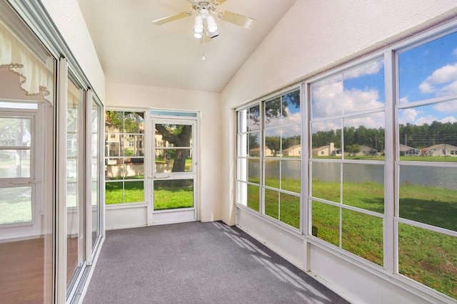 4407 Whitton Way, New Port Richey, FL 34653 - unfurnished sunroom with lofted ceiling, ceiling fan, and carpet