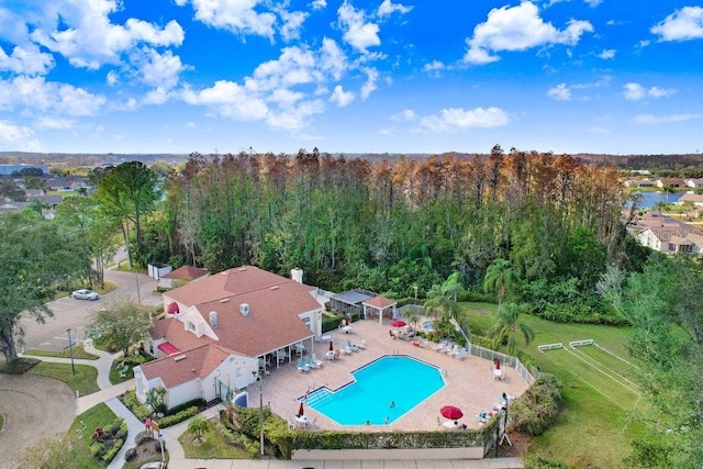 4407 Whitton Way, New Port Richey, FL 34653 - view of property location featuring a pool area and a forest