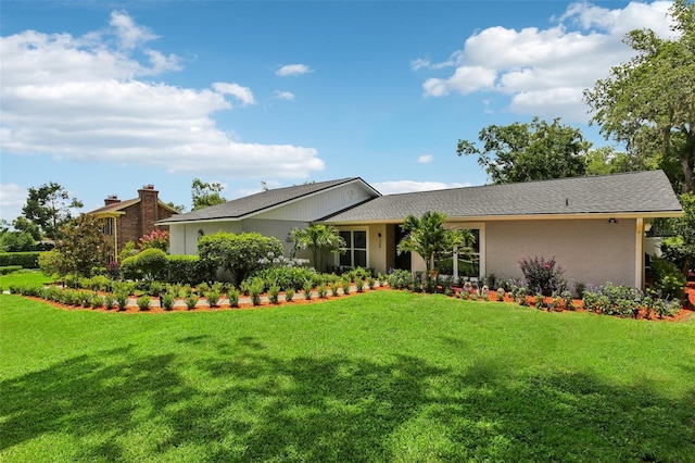 126 Holly Tree Ln, Brandon, FL 33511 - ranch-style house with a front lawn and stucco siding