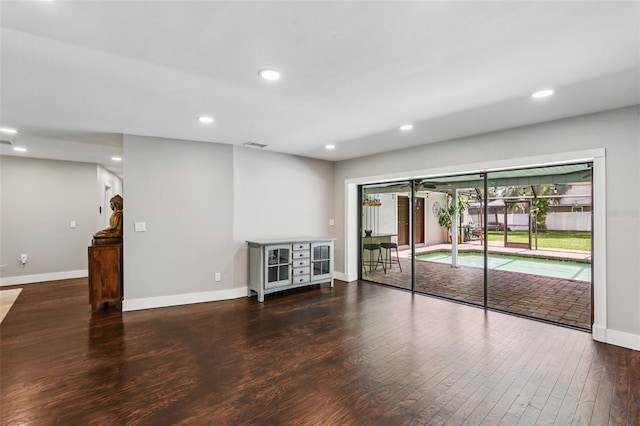 126 Holly Tree Ln, Brandon, FL 33511 - empty room with wood finished floors and recessed lighting