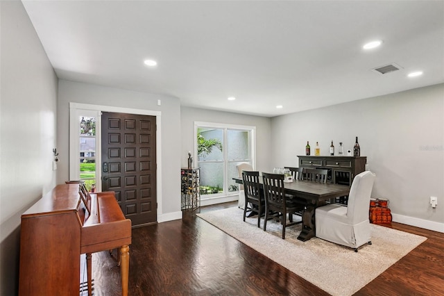 126 Holly Tree Ln, Brandon, FL 33511 - dining room with recessed lighting and dark wood finished floors