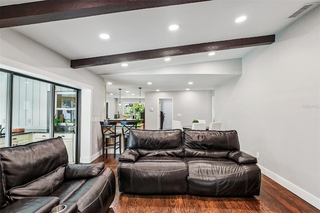 126 Holly Tree Ln, Brandon, FL 33511 - living room with beam ceiling, dark wood finished floors, and recessed lighting
