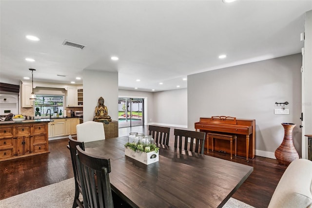 126 Holly Tree Ln, Brandon, FL 33511 - dining area featuring dark wood-style floors and recessed lighting