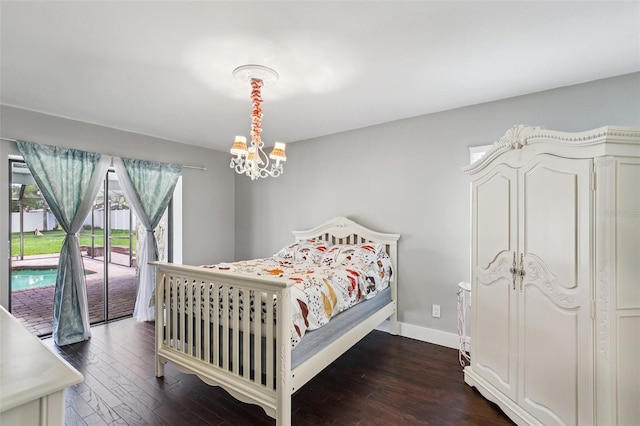 126 Holly Tree Ln, Brandon, FL 33511 - bedroom with access to outside, dark wood finished floors, and a chandelier