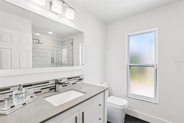 126 Holly Tree Ln, Brandon, FL 33511 - bathroom featuring a stall shower, vanity, and tasteful backsplash