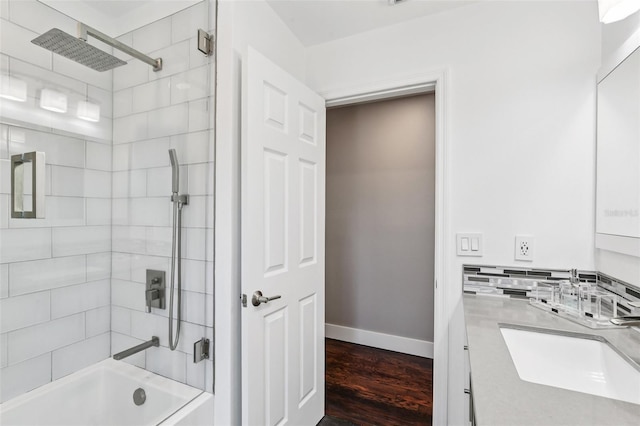 126 Holly Tree Ln, Brandon, FL 33511 - full bathroom featuring  shower combination, vanity, and wood finished floors