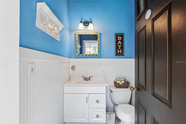 126 Holly Tree Ln, Brandon, FL 33511 - bathroom with a wainscoted wall and vanity