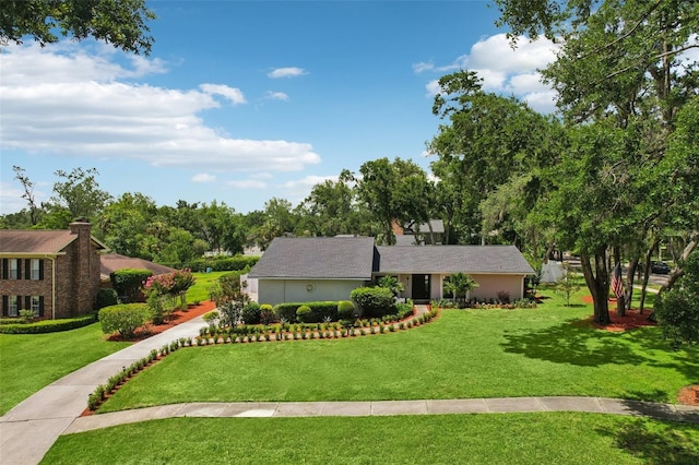 126 Holly Tree Ln, Brandon, FL 33511 - view of front of property with a front yard