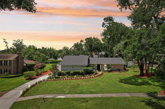 126 Holly Tree Ln, Brandon, FL 33511 - view of front of house with a yard