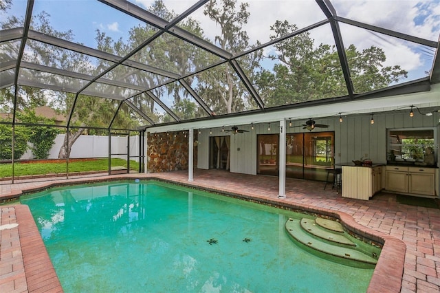 126 Holly Tree Ln, Brandon, FL 33511 - view of swimming pool with a patio area, a ceiling fan, and glass enclosure