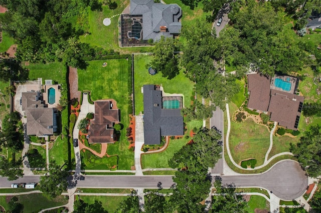 126 Holly Tree Ln, Brandon, FL 33511 - aerial view of property's location with a pool area and nearby suburban area