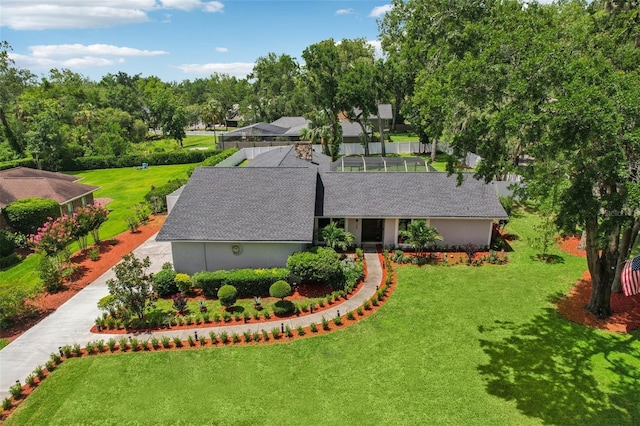 126 Holly Tree Ln, Brandon, FL 33511 - view of front of home featuring a front yard and stucco siding