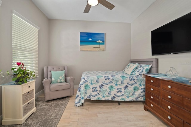6408 Seasound Dr, Apollo Beach, FL 33572 - bedroom featuring light wood finished floors and a ceiling fan