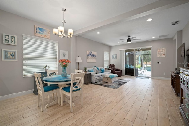 6408 Seasound Dr, Apollo Beach, FL 33572 - dining room with light wood-type flooring, a ceiling fan, a chandelier, and recessed lighting