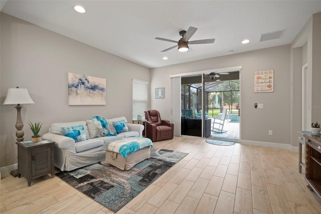 6408 Seasound Dr, Apollo Beach, FL 33572 - living area with ceiling fan, light wood finished floors, and recessed lighting