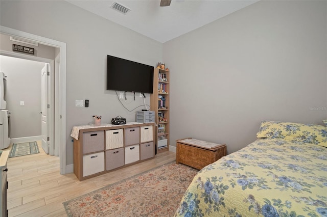 6408 Seasound Dr, Apollo Beach, FL 33572 - bedroom featuring light wood finished floors and a ceiling fan