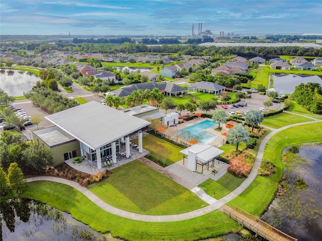 6408 Seasound Dr, Apollo Beach, FL 33572 - aerial perspective of suburban area with a large body of water and a pool