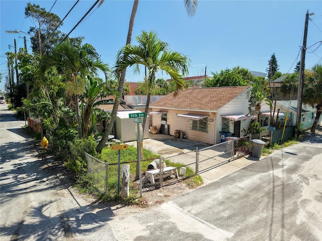 100 94th Ave, Treasure Island, FL 33706 - view of front of house with a gate