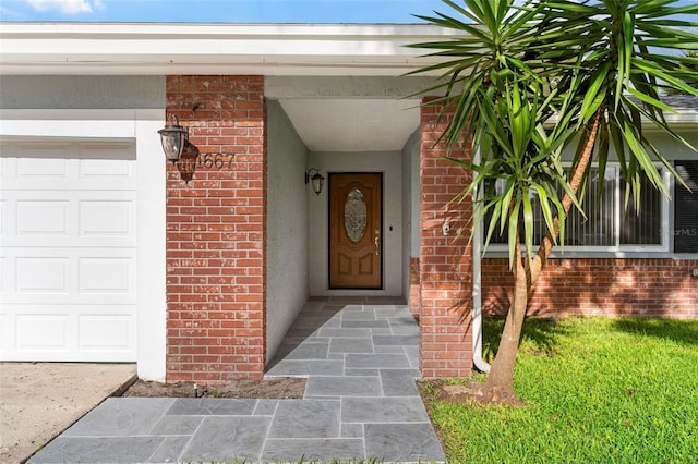 1667 E Orangeside Rd, Palm Harbor, FL 34683 - doorway to property with brick siding and an attached garage