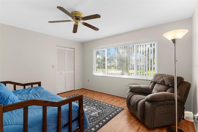 1667 E Orangeside Rd, Palm Harbor, FL 34683 - bedroom featuring wood finished floors, a closet, and ceiling fan