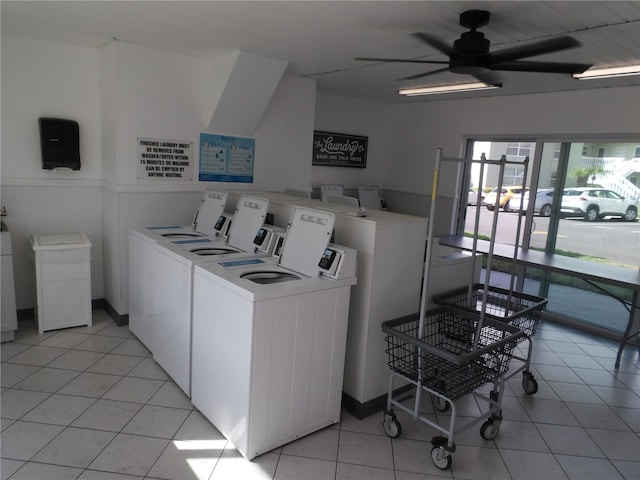1250 S Pinellas Ave Unit 1013, Tarpon Springs, FL 34689 - community laundry room with independent washer and dryer, a ceiling fan, light tile patterned floors, and a wainscoted wall