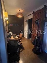 2001 E 2nd Ave Unit 27, Tampa, FL 33605 - office featuring a barn door