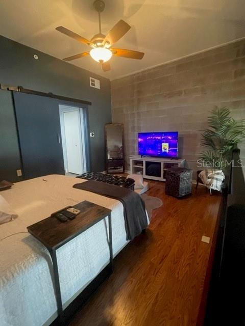 2001 E 2nd Ave Unit 27, Tampa, FL 33605 - bedroom with wood finished floors and ceiling fan