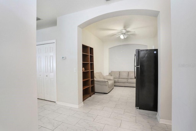 30247 Emmetts Ct, Wesley Chapel, FL 33543 - hall featuring light marble finish flooring and arched walkways