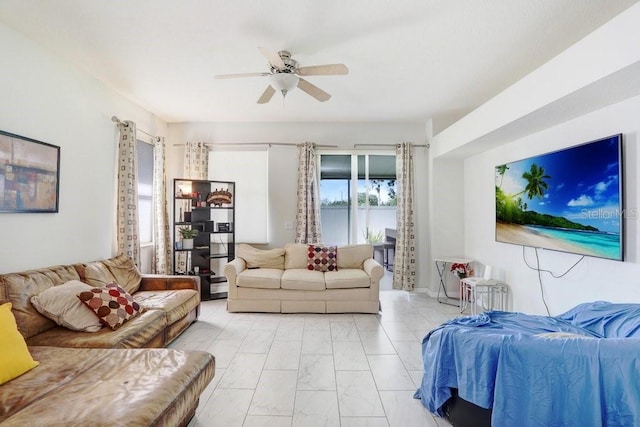 30247 Emmetts Ct, Wesley Chapel, FL 33543 - living area with ceiling fan and light marble finish flooring