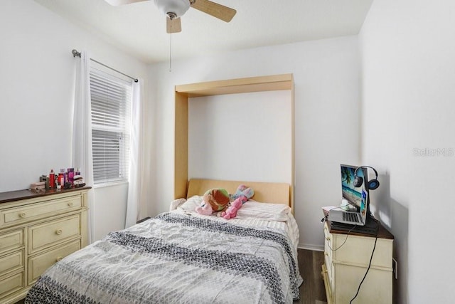 30247 Emmetts Ct, Wesley Chapel, FL 33543 - bedroom with wood finished floors and ceiling fan