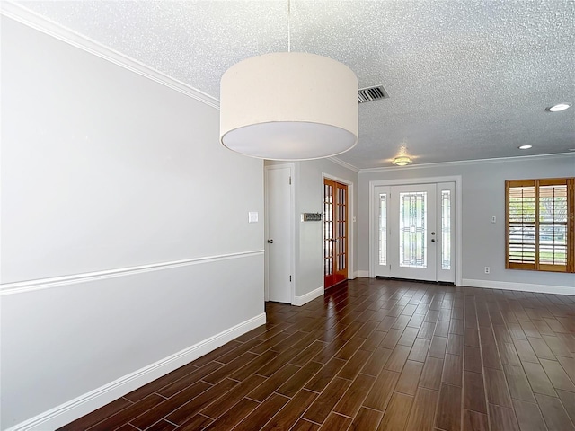 4002 Hudson Ter, Tampa, FL 33618 - spare room featuring a textured ceiling, dark wood-style flooring, crown molding, and recessed lighting