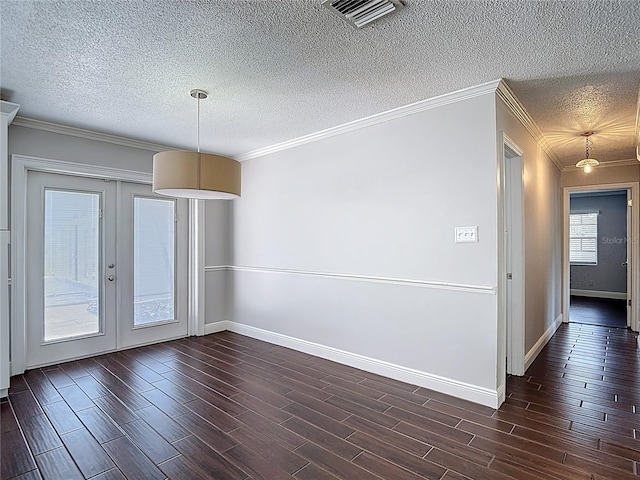 4002 Hudson Ter, Tampa, FL 33618 - unfurnished room with dark wood finished floors, a textured ceiling, french doors, and crown molding