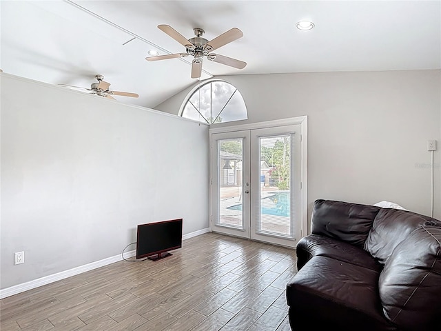 4002 Hudson Ter, Tampa, FL 33618 - living room featuring french doors, lofted ceiling, wood finished floors, ceiling fan, and recessed lighting