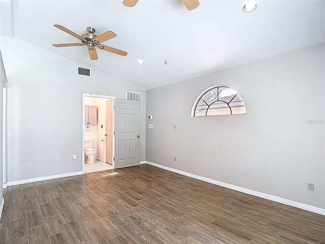 4002 Hudson Ter, Tampa, FL 33618 - unfurnished room with a ceiling fan, wood finished floors, vaulted ceiling, and recessed lighting