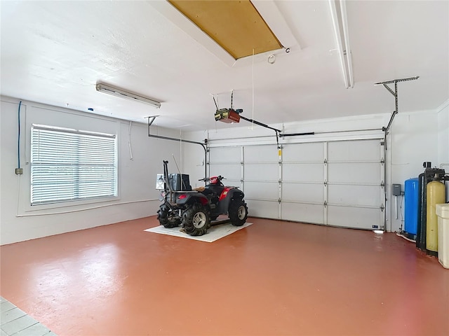 4002 Hudson Ter, Tampa, FL 33618 - garage featuring a garage door opener