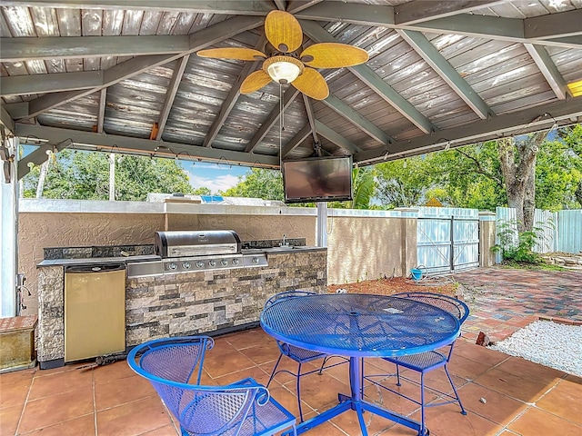 4002 Hudson Ter, Tampa, FL 33618 - view of patio with exterior kitchen and ceiling fan